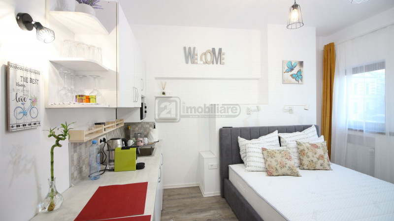 Universitate-Ghica1, apartament transformat in 2 garsoniere inchiriate in Airbnb